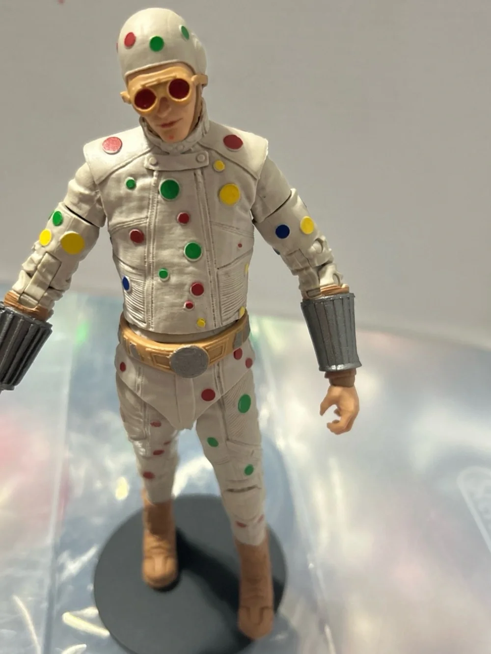 White Polka-Dot Action Figure with Multicolor Accents - Kids Toy